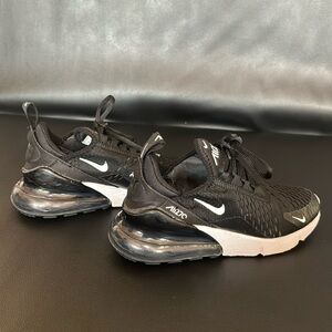 Girl’s used Nikes. Size 5.